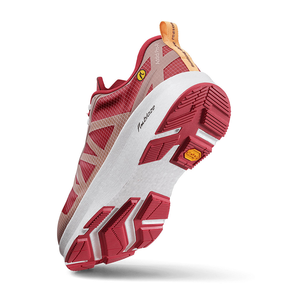 Die Vibram Sohle des Joe Nimble Addict Pro-R Laufschuh in Rot